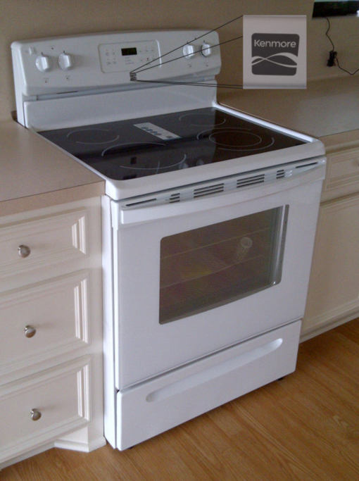 This is a picture of the new Kenmore stove/oven that was installed in the house for sale at 106 Magnolia Lane, Conroe, Texas 77304